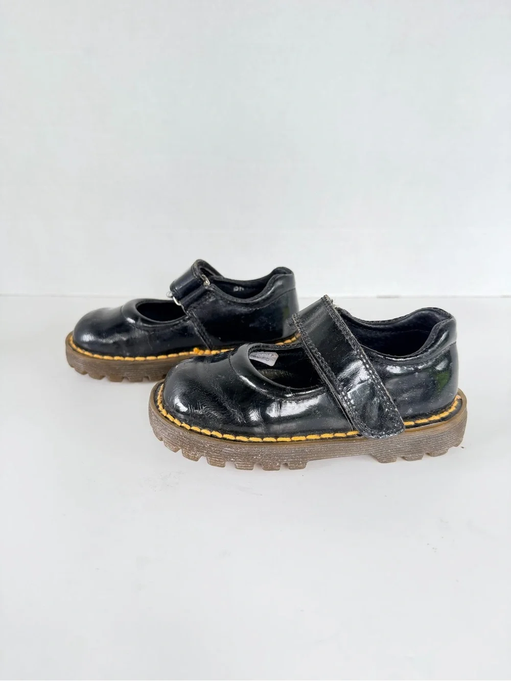 Dr. Martens Kids Black Mary Jane Shoes with Yellow Stitching
